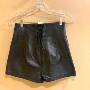 Rare vintage lace-up and zip-up 100% leather shorts